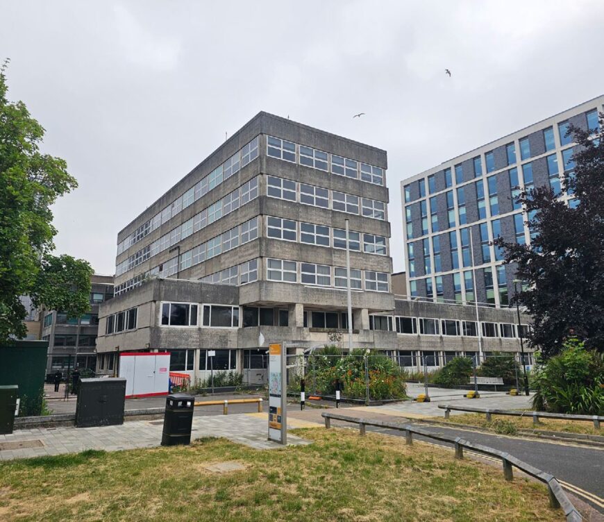 Town hall Crawley The Boulevard, a large building surrounded by trees and grass