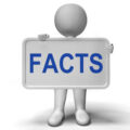 A grey person holding up a sign that says Facts in blue writing